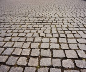 A cobblestone in the street during daytime